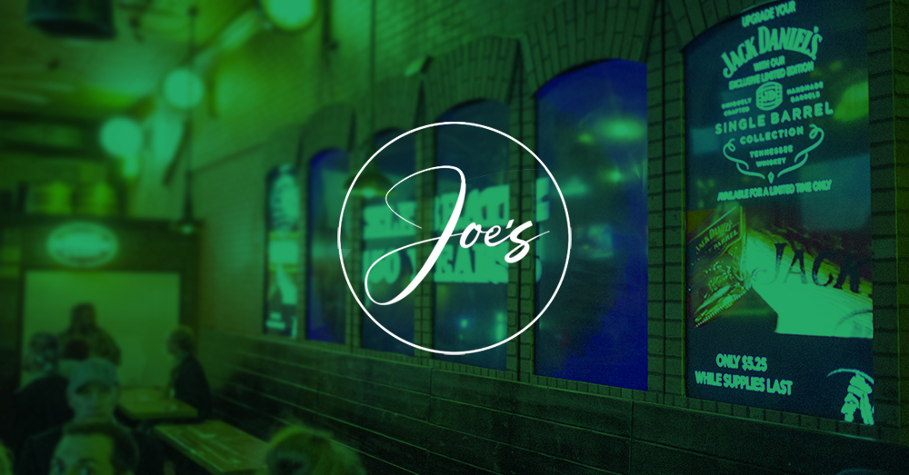 Smokin' Joe's video wall with green overlay and logo